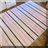 DR06. Pink striped rug. 